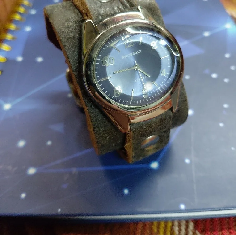 Red Monkey Blue Dial Watch on Brown Leather Cuff